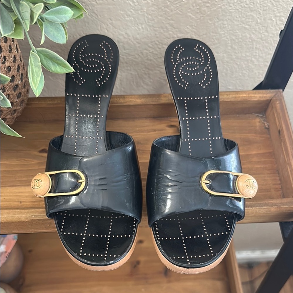 Chanel
Patent leather open toe mules size 9 B